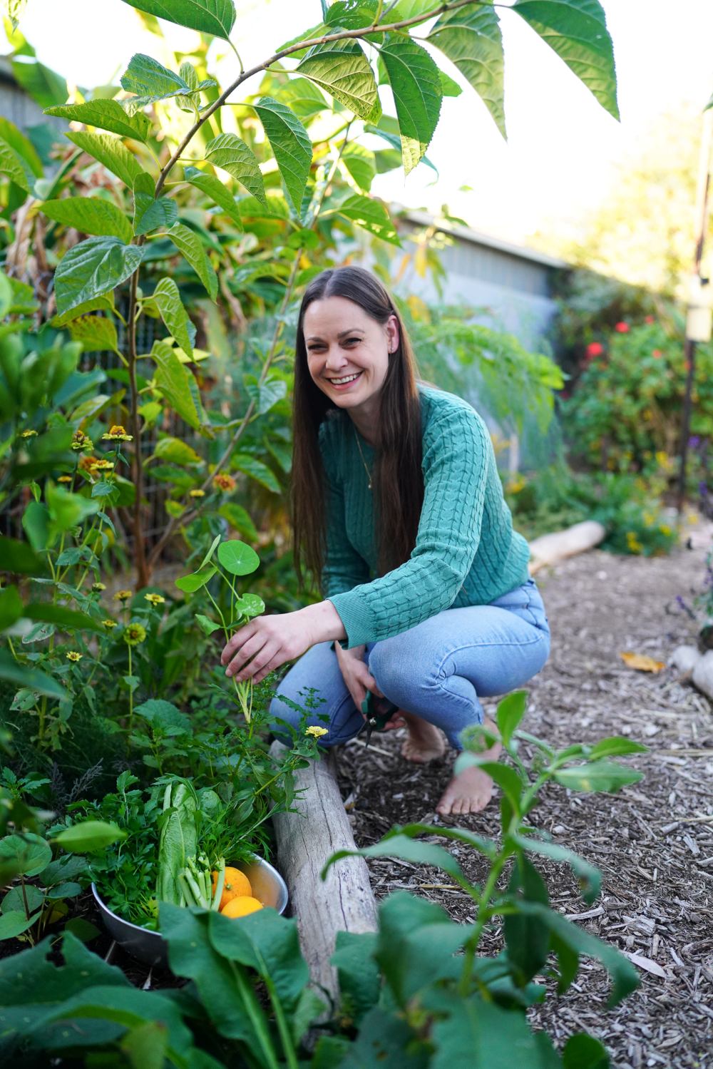 Koren Helbig in her backyard permaculture garden